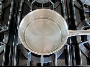 Boiling water in a saucepan.