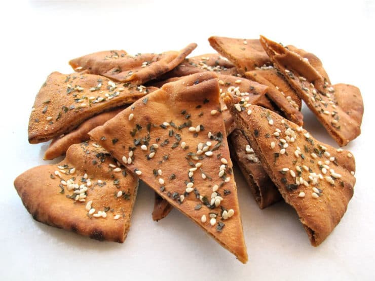 Close-up of Baked Pita Chips sprinkled with black and white sesame seeds