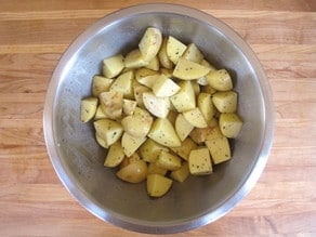 Diced Yukon gold potatoes in a mixing bowl.