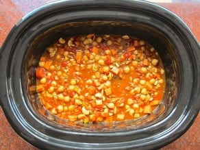 SlowaDiced tomatoes added to slow cooker. Cooker Vegan Chickpea Chili Recipe - Healthy Comfort Food