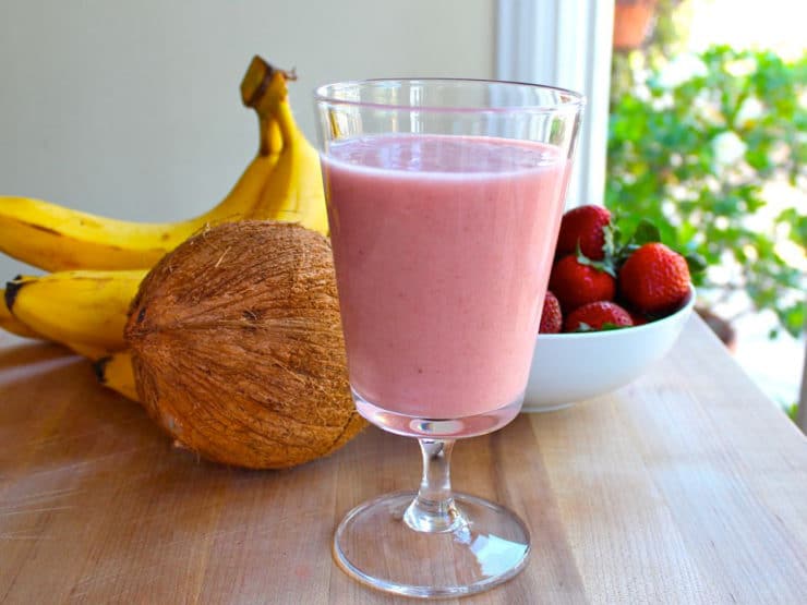 Rejuvenating Coconut Water Smoothie - This creamy coconut water smoothie will rejuvenate and rehydrate. Strawberries, bananas, coconut milk. Dairy free, gluten free