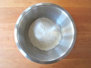 Flour sifted into a mixing bowl.