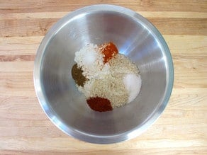 Flour and seasonings in a mixing bowl.