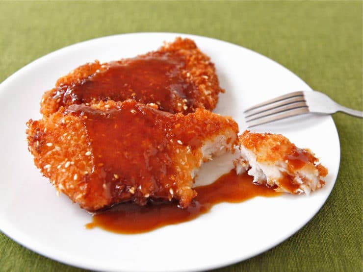 Crispy Panko Fish with Orange Sesame Sauce - Make crispy fried panko sesame fish with a sweet and spicy orange sesame sauce. Step-by-step photos and instructions. Kosher, Pareve.