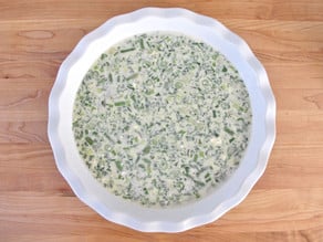 Quiche mixture in a bowl.