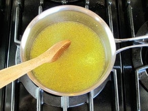 Making ginger syrup on stovetop for ginger beer.