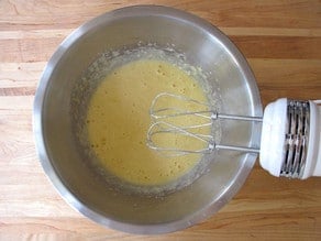 Eggs beaten into butter and sugar.