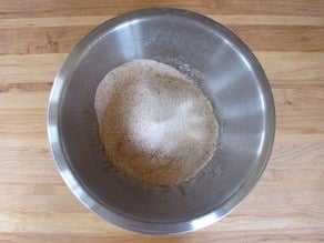 Dry ingredients sifted into a mixing bowl.