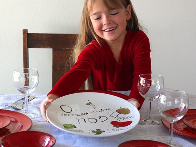 Homemade Seder Plates - Learn to make your own Seder plate at home using a plain white plate and nontoxic paint pens. Easy Jewish holiday craft for kids and family.