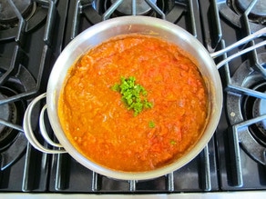 Jalapenos added to pan on the stove.