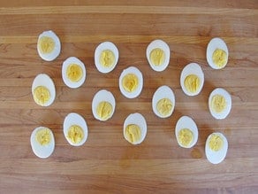 Hard boiled eggs sliced in half.