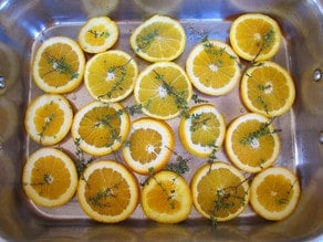 Orange slices on a baking sheet.