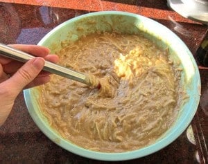 Eggs whisked in a mixing bowl.