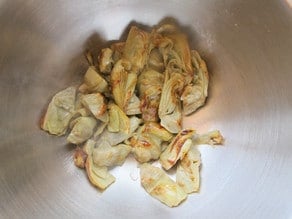 Artichoke hearts in a bowl.