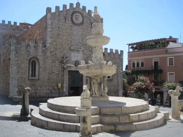 Stone church with dry fountain - Taormina, Italy.