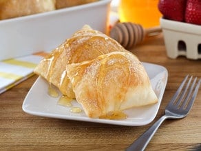 Sopapillas – Fried Pastry Topped with Cinnamon Sugar and Honey.