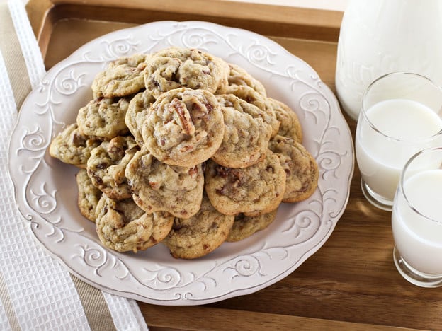 Date Cookies - Butter cookies with gooey dates and toasted pecans. Time-Tested Family Recipe from Kelly Jaggers. 