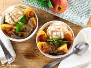 Grilled Peach Sundae with Brandy Butterscotch Sauce - Recipe for grilled ripe peaches and creamy caramelized sauce over vanilla frozen yogurt. 