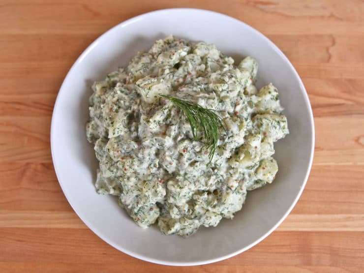 Potato Salad with Dill and Dijon - A unique and flavorful chilled salad recipe with new potatoes, mayonnaise, whole grain dijon mustard, vinegar and fresh dill. 