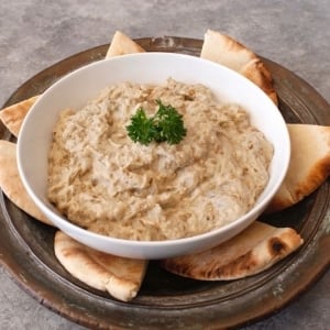 Creamy Baba Ghanoush - Recipe for luscious Middle Eastern roasted eggplant dip, rich with sesame tahini. Healthy and tasty!