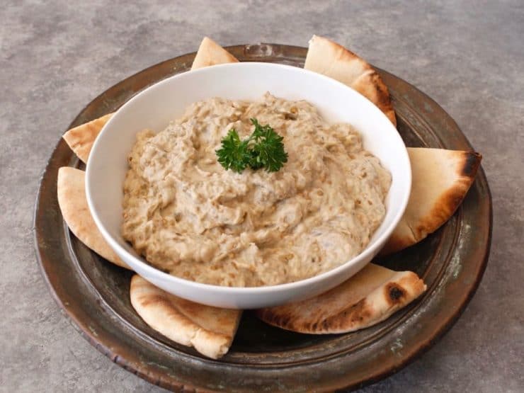 Creamy Baba Ghanoush - Recipe for luscious Middle Eastern roasted eggplant dip, rich with sesame tahini. Healthy and tasty!