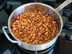 Fava beans simmering on the stove.