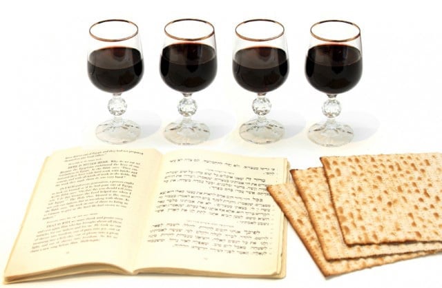 Celebrating Passover with four glasses of wine, a Haggadah and matzo