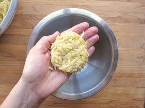 Forming latkes.