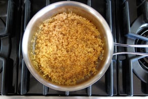 Cooked quinoa in a saucepan.