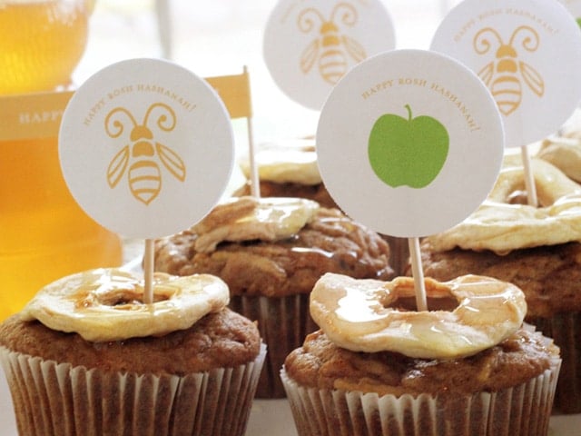 Apple cupcakes with honey and honey bees on top, a sweet treat with a touch of nature's sweetness