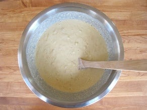 Eggs and cream stirred into apple filling.