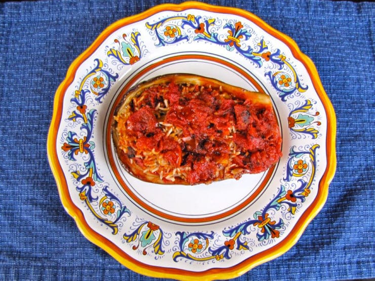 Vegetarian Stuffed Eggplant - Eggplant stuffed with chickpeas, pine nuts, tomatoes, onion, garlic, herbs and spices. Vegan, pareve, gluten free, all natural.