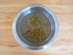 Raisins soaking in warm water.