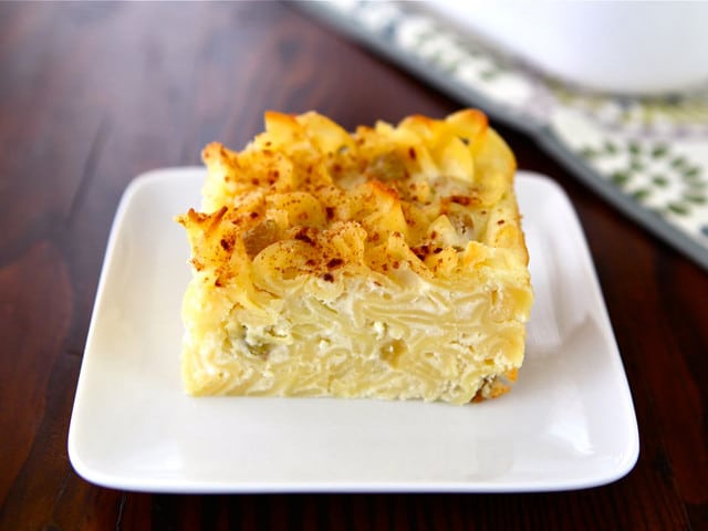 Sweet Lokshen Kugel - Learn to make traditional Yiddish dairy noodle pudding with cottage cheese, sour cream, cream cheese, sugar, and cinnamon. Kosher