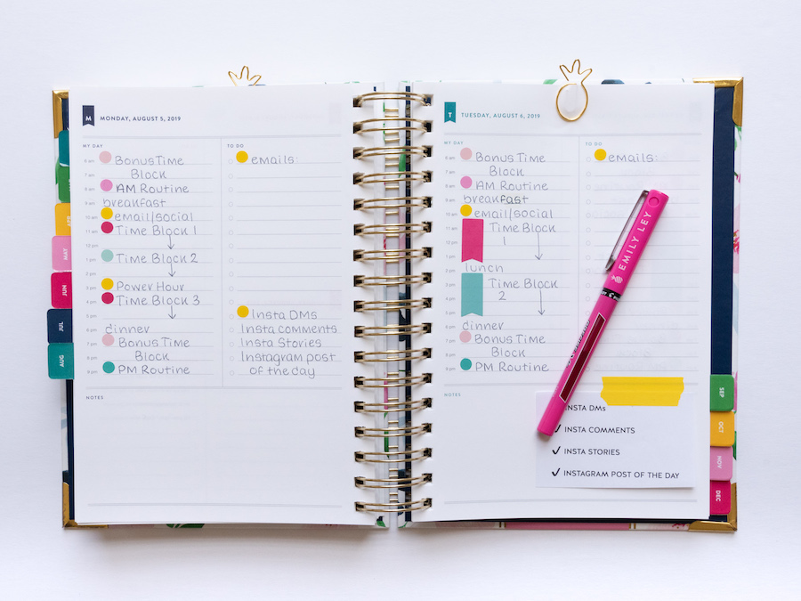 Daily Simplified Planner lying open to show how I use color-coding stickers to time block and schedule my day