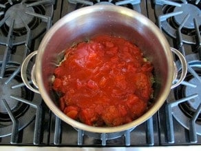 Tomato sauce poured over meat and cabbage.