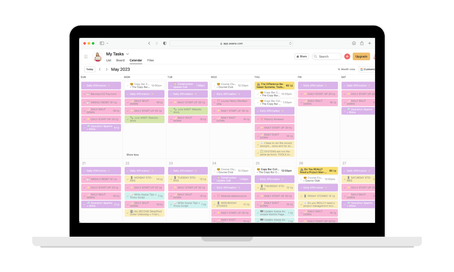 Screenshot showing the monthly My Tasks view in Asana on a laptop mockup