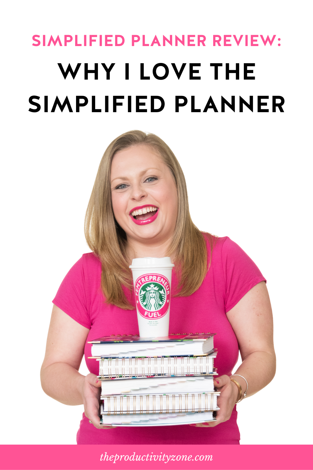Alexandra of The Productivity Zone holding a stack of Simplified Planners